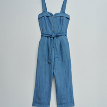 Load image into Gallery viewer, Blue denim jumpsuit on a light gray background
