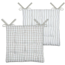 Load image into Gallery viewer, Two square quilted floor cushions with tie straps, shown overlapping on a white background. One cushion has a light gray and white gingham check pattern, and the other has vertical light gray and white stripes.

