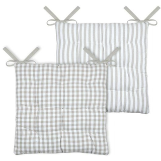 Two square quilted floor cushions with tie straps, shown overlapping on a white background. One cushion has a light gray and white gingham check pattern, and the other has vertical light gray and white stripes.