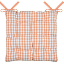Load image into Gallery viewer, A square tufted cushion with a peach and white gingham check pattern, featuring two peach ties at the top corners, shown against a plain white background.
