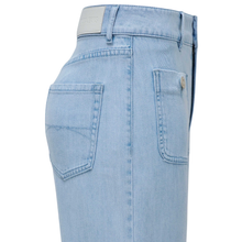 Load image into Gallery viewer, Light blue jeans with a brand logo on a white background
