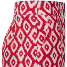 Load image into Gallery viewer, Red and white patterned skirt on a white background
