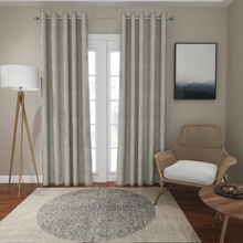 Load image into Gallery viewer, Eyelet curtains on a patio door with Silver pole 
