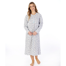 Load image into Gallery viewer, A model smiling while wearing the Slenderella Ditsy Floral Jersey Nightdress in Grey.
