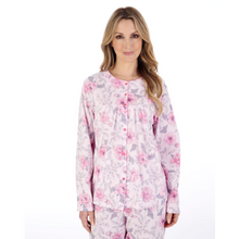 Load image into Gallery viewer, A close up of a model wearing the Slenderella Picot Trim Jersey Pyjama Set in Pink. 
