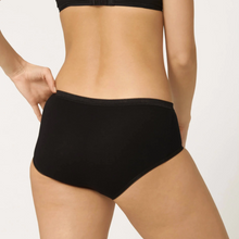 Load image into Gallery viewer, A model showing the back of the Sloggi midi brief in Black. 
