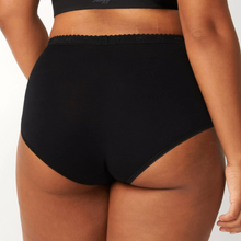 Load image into Gallery viewer, A close up of a model showing the back of the Sloggi Chic Maxi Brief in Black.

