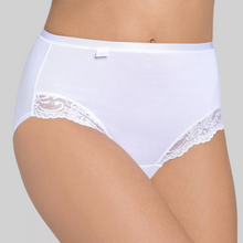 Load image into Gallery viewer, A model wearing the Sloggi Romance Maxi Brief in White. 
