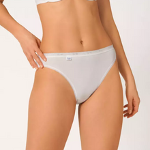 Load image into Gallery viewer, A close up of a model wearing the Sloggi Tai Brief in White. 
