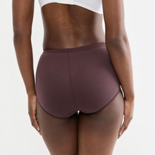 Load image into Gallery viewer, Rear view of a model wearing high-waisted, seamless underwear in a muted plum-brown color, shown against a plain light gray background.
