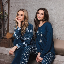 Load image into Gallery viewer, two women with snowflake PJS 
