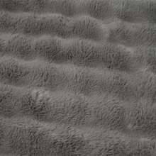 Load image into Gallery viewer, A close-up of a gray shaggy faux fur fabric texture with horizontal ridges.
