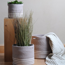 Load image into Gallery viewer, Set of 3 planters in soft grey with white stripe, 3 sizes from Large, Medium and small in a lifestyle display
