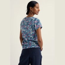Load image into Gallery viewer, Rear of top on lady with navy trouser 
