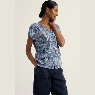 Top on lady with Navy trousers 