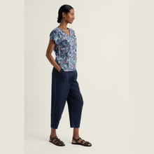 Load image into Gallery viewer, Top on lady with navy trouser 
