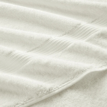 Load image into Gallery viewer, Close-up of almond fabric with a textured pattern
