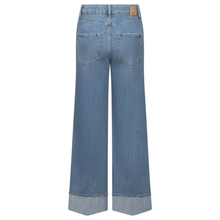 Load image into Gallery viewer, Blue jeans on a white background
