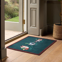 Load image into Gallery viewer, Floor mat at doorway 

