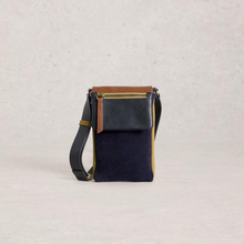Load image into Gallery viewer, Small black crossbody bag with brown accents on a light gray background
