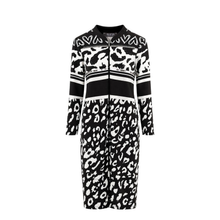 Load image into Gallery viewer, A long-sleeve knit dress by TONAR featuring a bold black and white patterned design with leopard print, horizontal stripes, and heart motifs.
