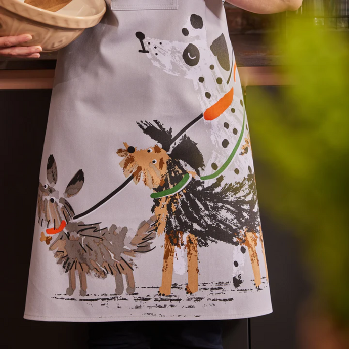 Apron on model with mixing bowl in hand 