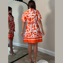Load image into Gallery viewer, female model wearing girl in mind verity shirt dress in orange colour with arms down by side
