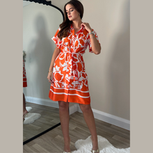 Load image into Gallery viewer, female model wearing girl in mind verity shirt dress in orange colour looking away from camera
