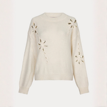 Load image into Gallery viewer, An off-white knit sweater with decorative cutout details on the chest and sleeves, accented with gold sequins, shown against a plain light background.
