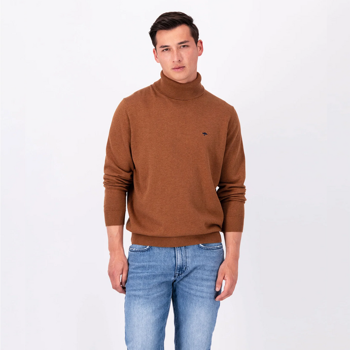 Model wearing the Walnut Brown coloured Fynch Hatton Polo Neck with sleeves pushed up too elbows, wearing blue jeans