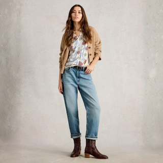 Image of Model standing wearing the White Stuff SS Nelly Notch Neck Tee, with a white background.