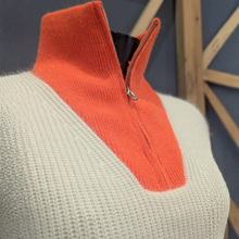 Load image into Gallery viewer, Close up of Twns The Label Breckenridge White/Neon Orange, with a wooden and blue background.
