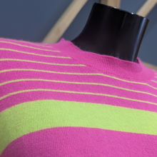 Load image into Gallery viewer, Close up of Twns The Label Orleans Neon Pink/Yellow set on a mannequin, with a wooden and blue background.

