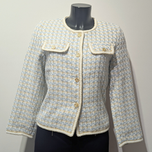 Load image into Gallery viewer, Tweed jacket on a mannequin against a plain background
