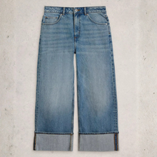 Load image into Gallery viewer, Pair of blue jeans on a light gray background
