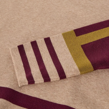 Load image into Gallery viewer, Close-up of a knit textile with a beige base, dark burgundy stripes, and a mustard yellow geometric block pattern.
