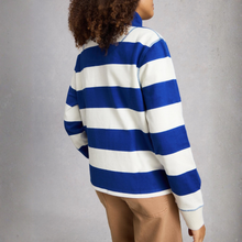 Load image into Gallery viewer, Person wearing a blue and white striped sweater against a gray background
