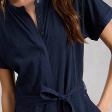 Load image into Gallery viewer, Navy blue jumpsuit with a belt on a neutral background
