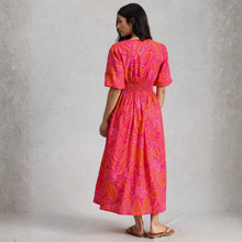 Load image into Gallery viewer, women in dress rear 
