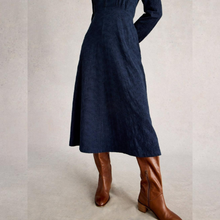 Load image into Gallery viewer, Navy blue dress worn by a person on a light gray background
