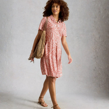 Load image into Gallery viewer, Woman in dress on grey background
