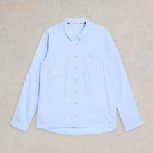 Load image into Gallery viewer, Light blue shirt with small patterns on a beige background
