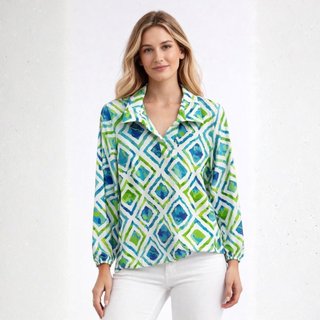 Woman wearing a colorful geometric patterned shirt on a white background