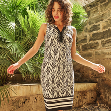 Load image into Gallery viewer, image of a model wearing a sleeveless black and white print summer dress
