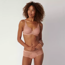 Load image into Gallery viewer, A picture of a model wearing the Aura Spotlight Bra and Maxi Brief in Rose. 
